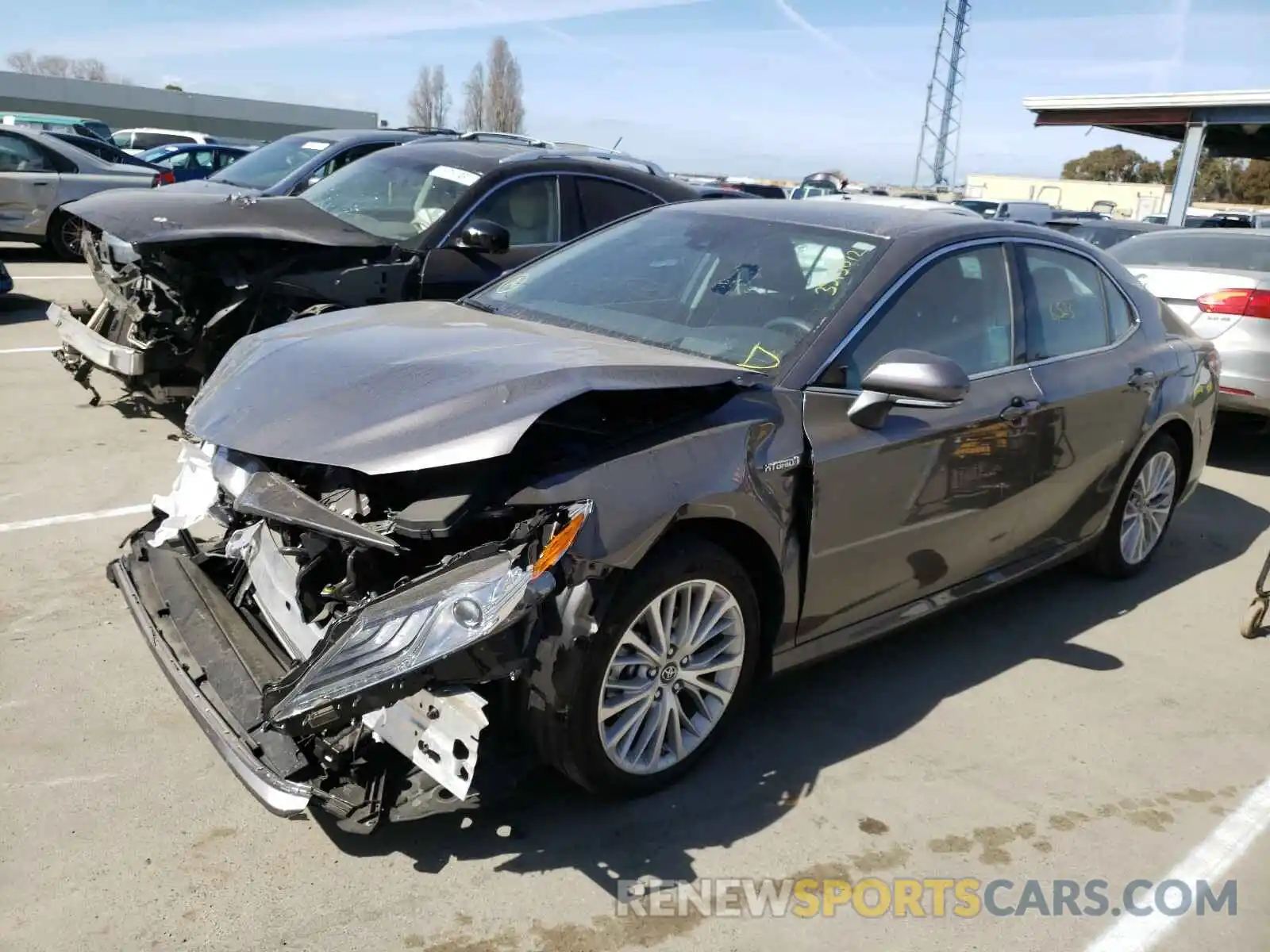 2 Photograph of a damaged car 4T1B21HK6KU518393 TOYOTA CAMRY 2019