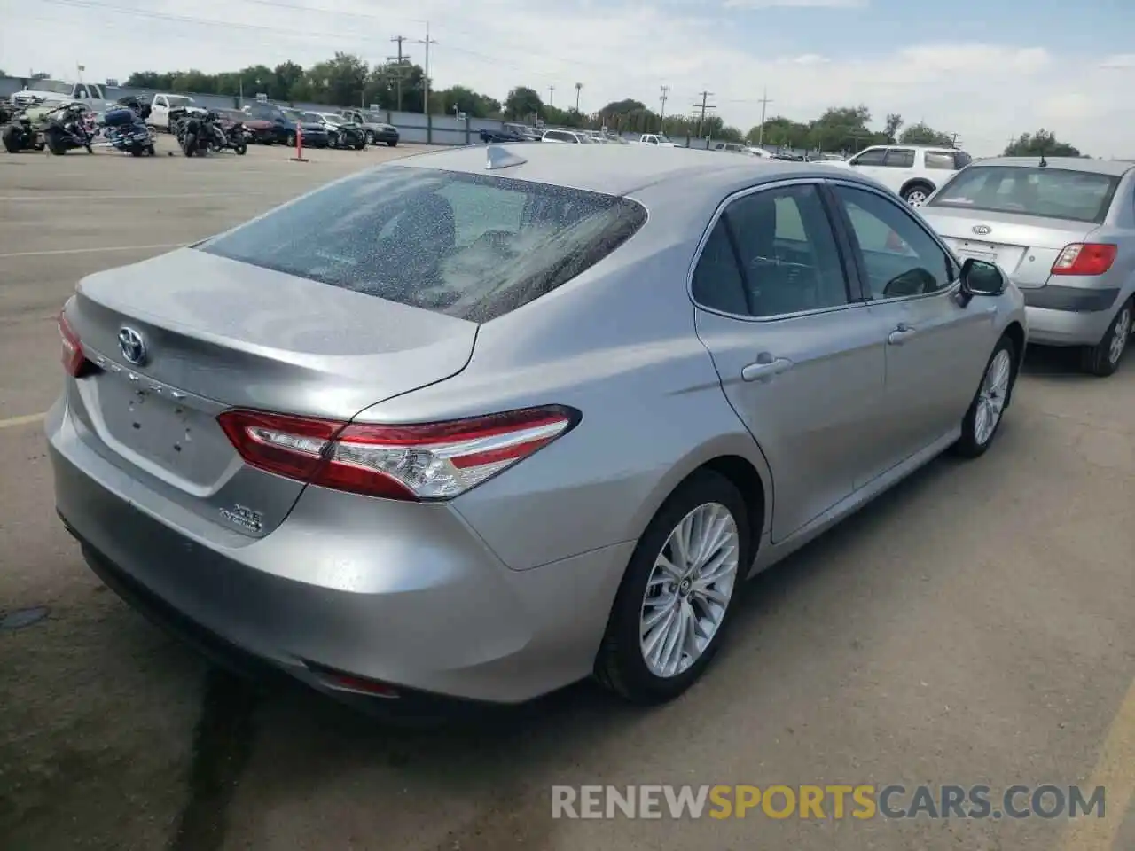 4 Photograph of a damaged car 4T1B21HK8KU521585 TOYOTA CAMRY 2019