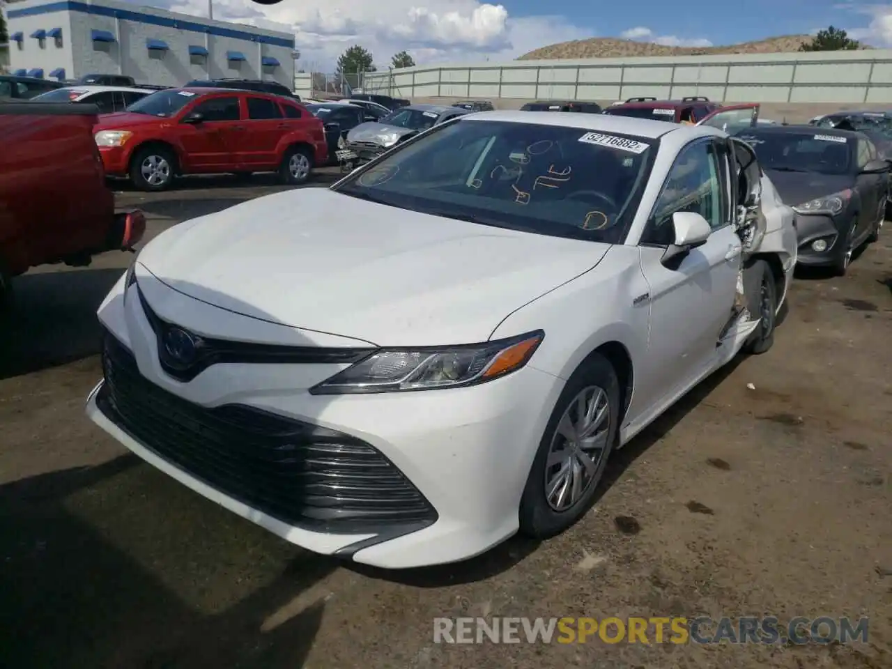 2 Photograph of a damaged car 4T1B31HK0KU004889 TOYOTA CAMRY 2019