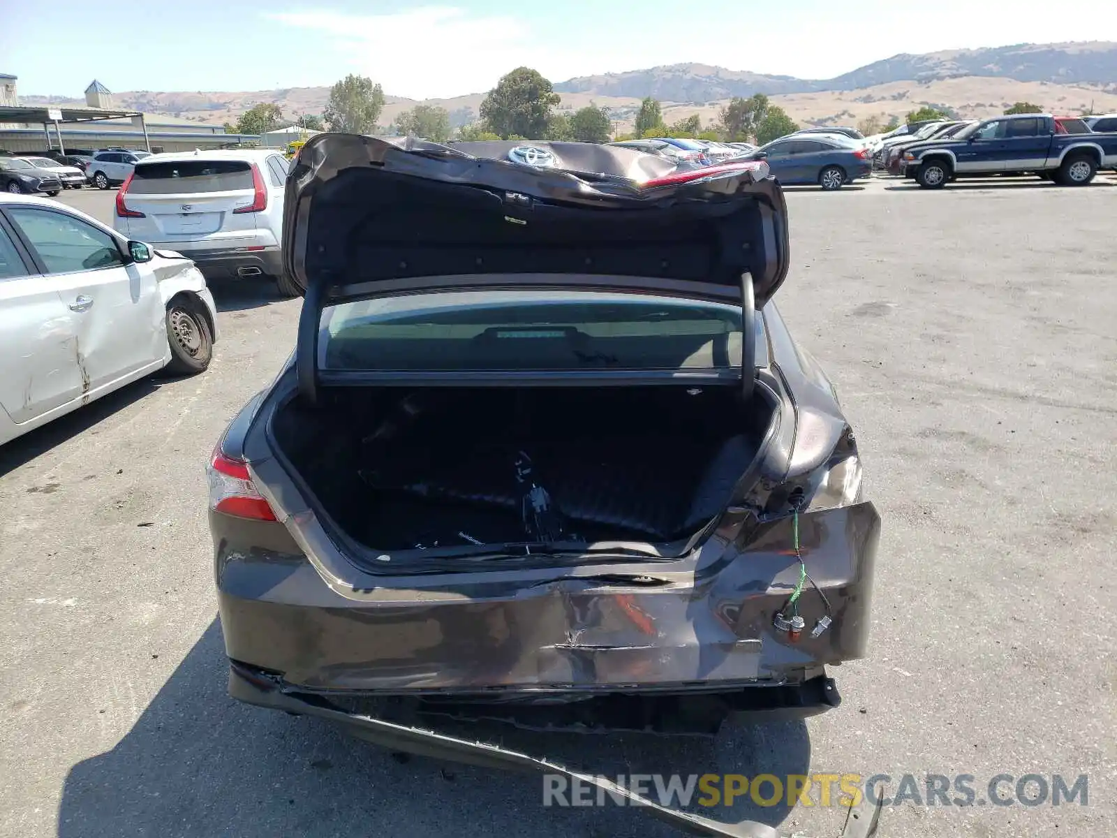 9 Photograph of a damaged car 4T1B31HK0KU514319 TOYOTA CAMRY 2019