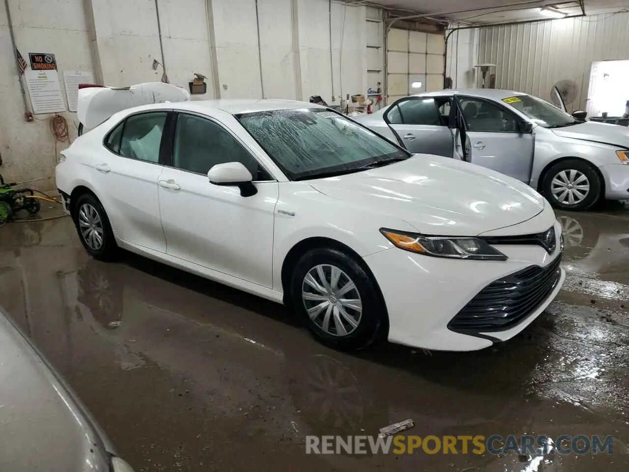 4 Photograph of a damaged car 4T1B31HK3KU004904 TOYOTA CAMRY 2019