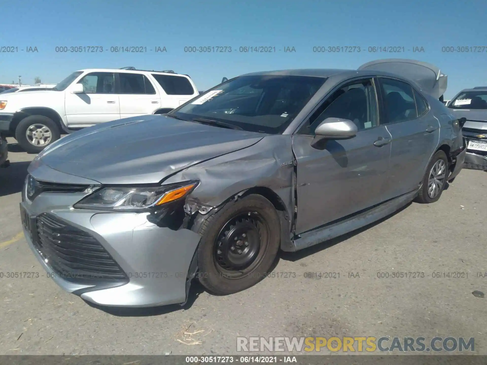 2 Photograph of a damaged car 4T1B31HK7KU005392 TOYOTA CAMRY 2019