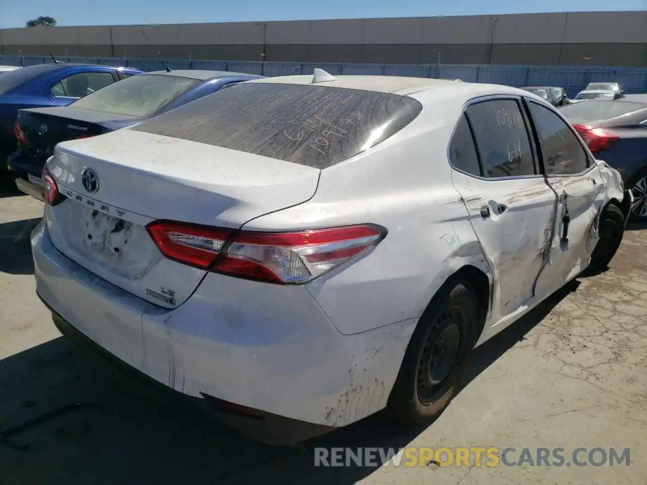 4 Photograph of a damaged car 4T1B31HK7KU005828 TOYOTA CAMRY 2019