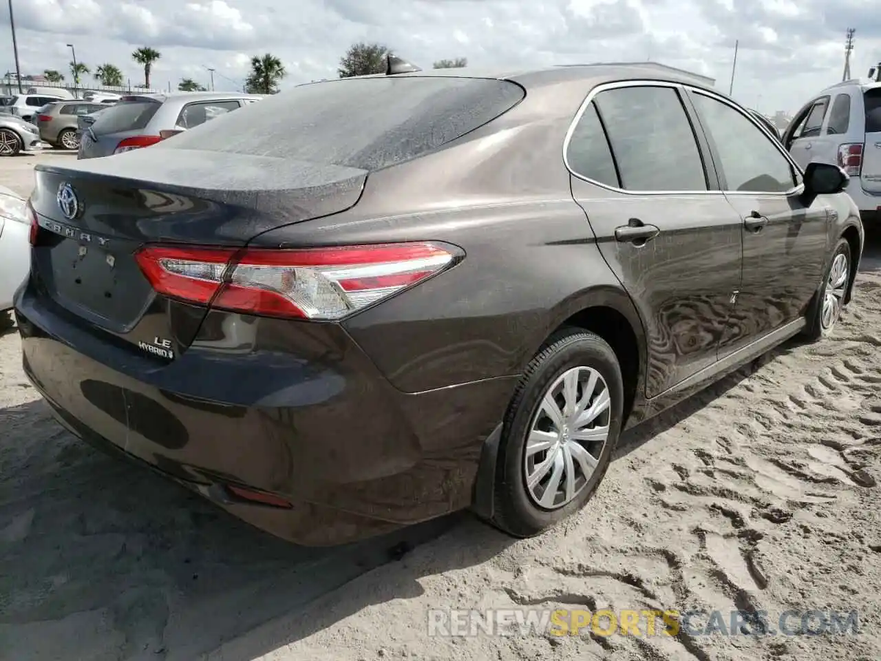 4 Photograph of a damaged car 4T1B31HK9KU509703 TOYOTA CAMRY 2019