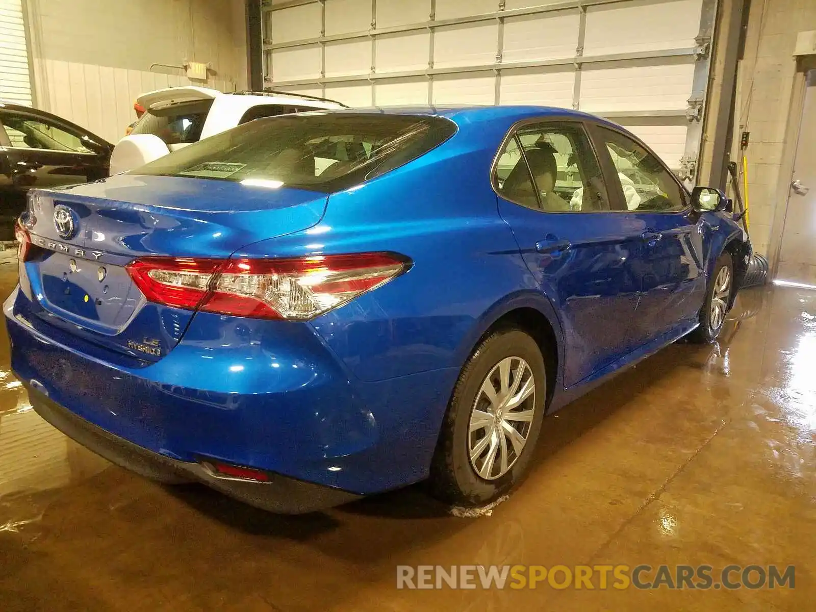 4 Photograph of a damaged car 4T1B31HKXKU008061 TOYOTA CAMRY 2019