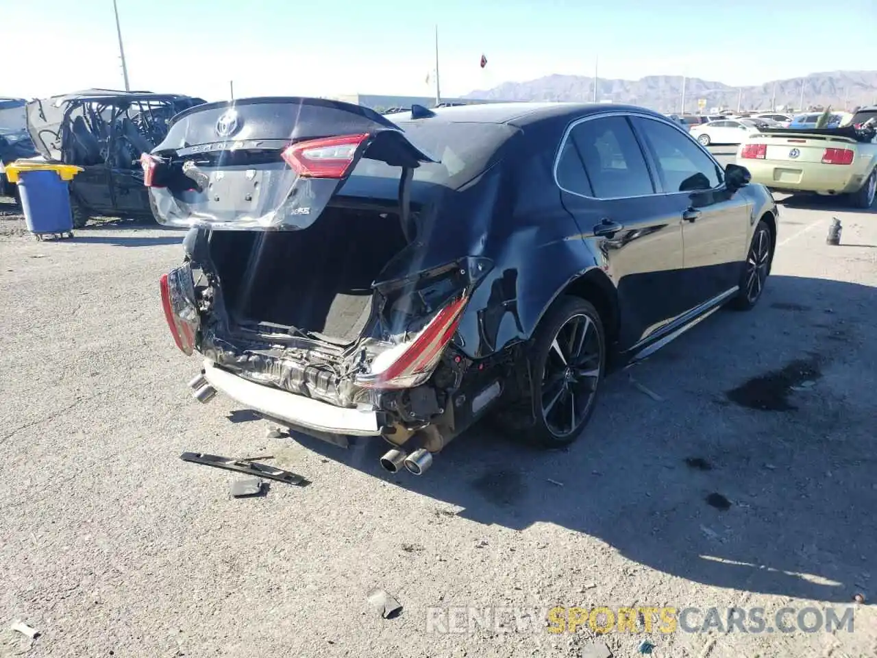 4 Photograph of a damaged car 4T1B61HK0KU212438 TOYOTA CAMRY 2019