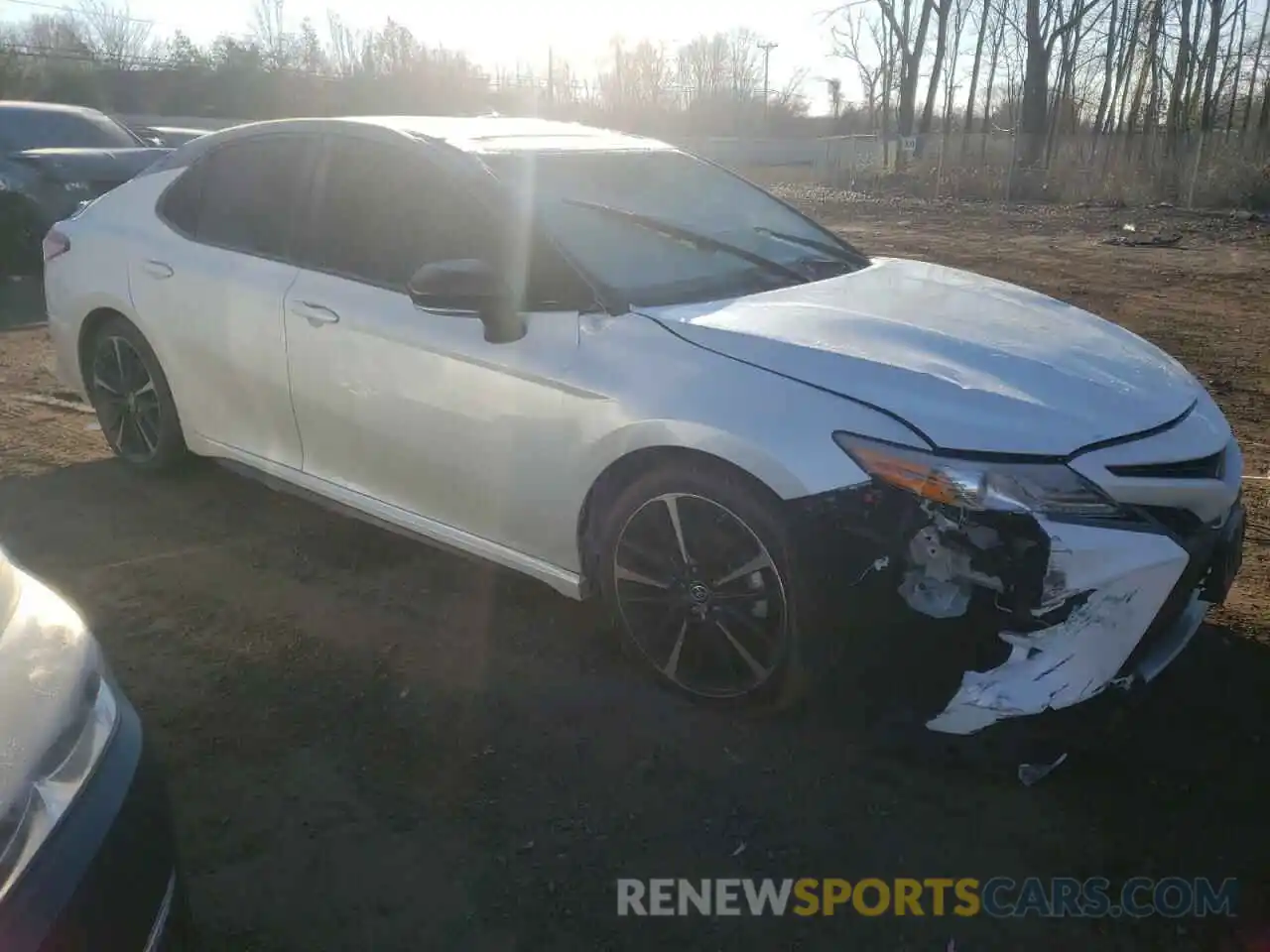 4 Photograph of a damaged car 4T1B61HK0KU214416 TOYOTA CAMRY 2019