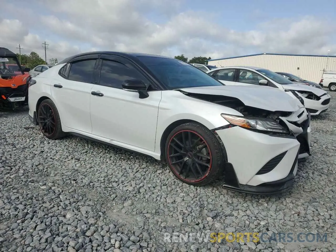 4 Photograph of a damaged car 4T1B61HK0KU290525 TOYOTA CAMRY 2019