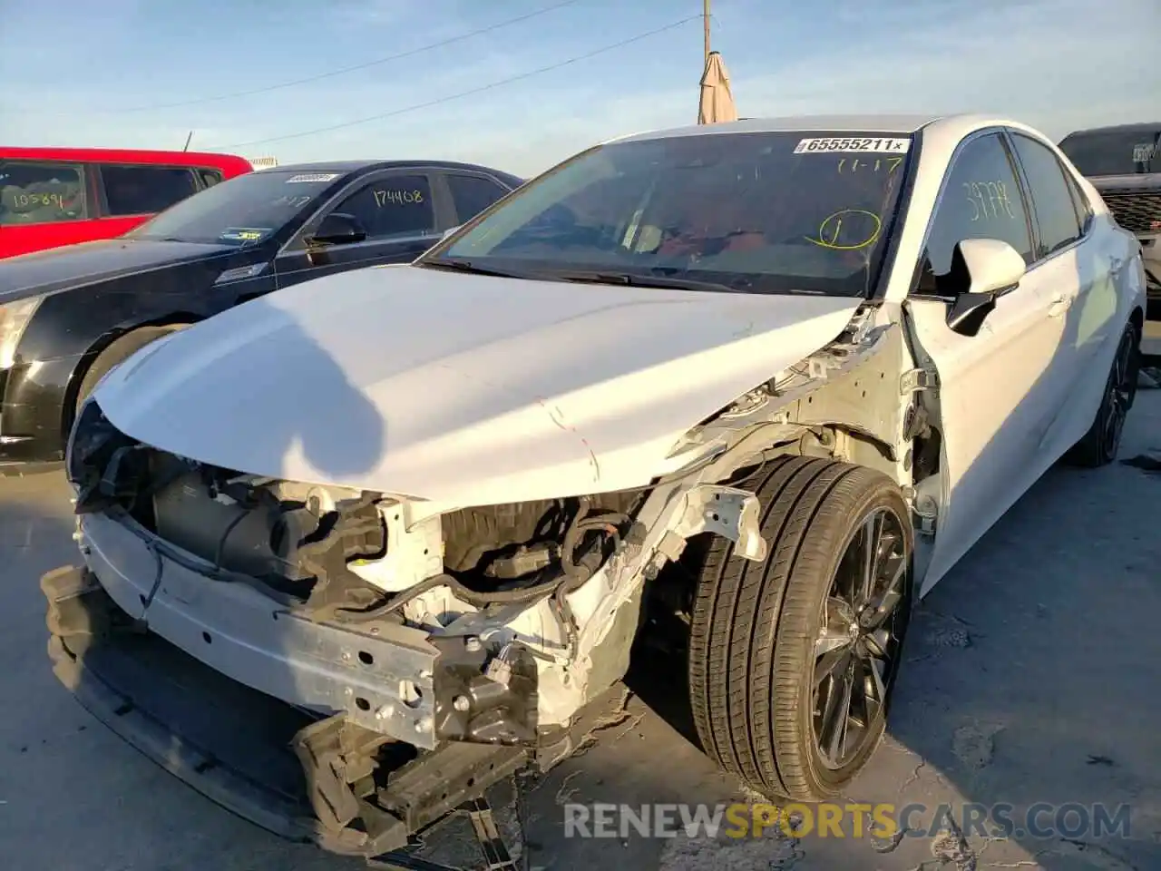 2 Photograph of a damaged car 4T1B61HK0KU768393 TOYOTA CAMRY 2019