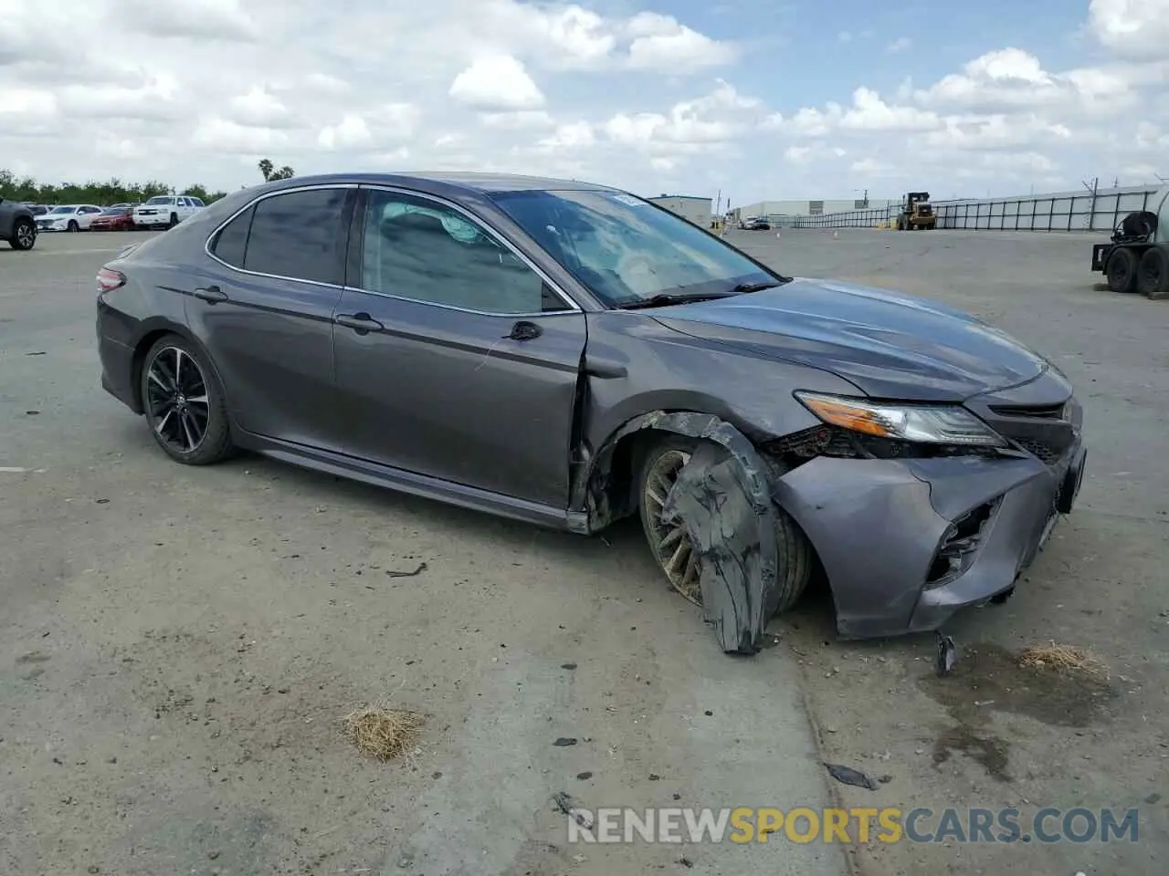 4 Photograph of a damaged car 4T1B61HK0KU828883 TOYOTA CAMRY 2019