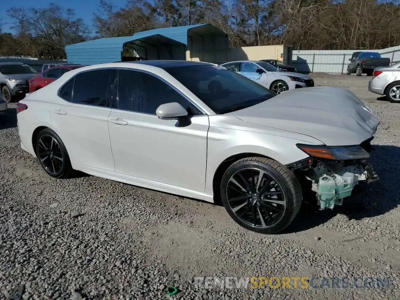 4 Photograph of a damaged car 4T1B61HK0KU842718 TOYOTA CAMRY 2019