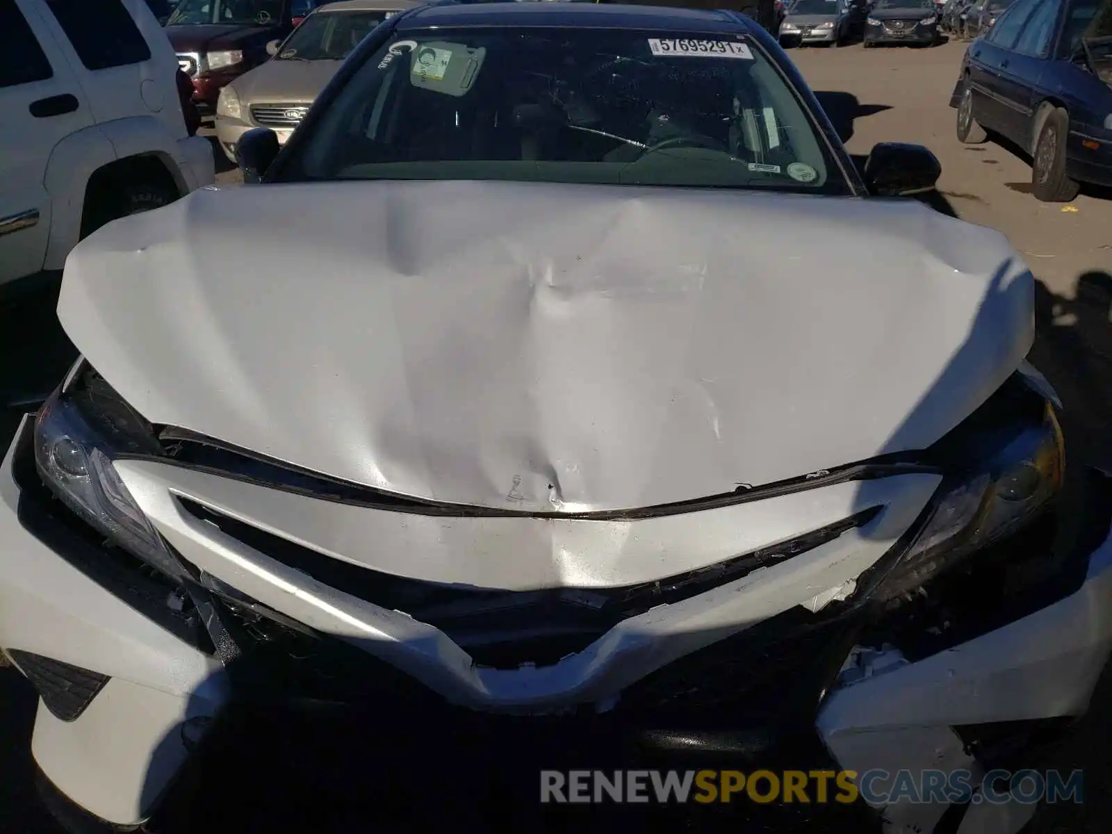 7 Photograph of a damaged car 4T1B61HK1KU219124 TOYOTA CAMRY 2019