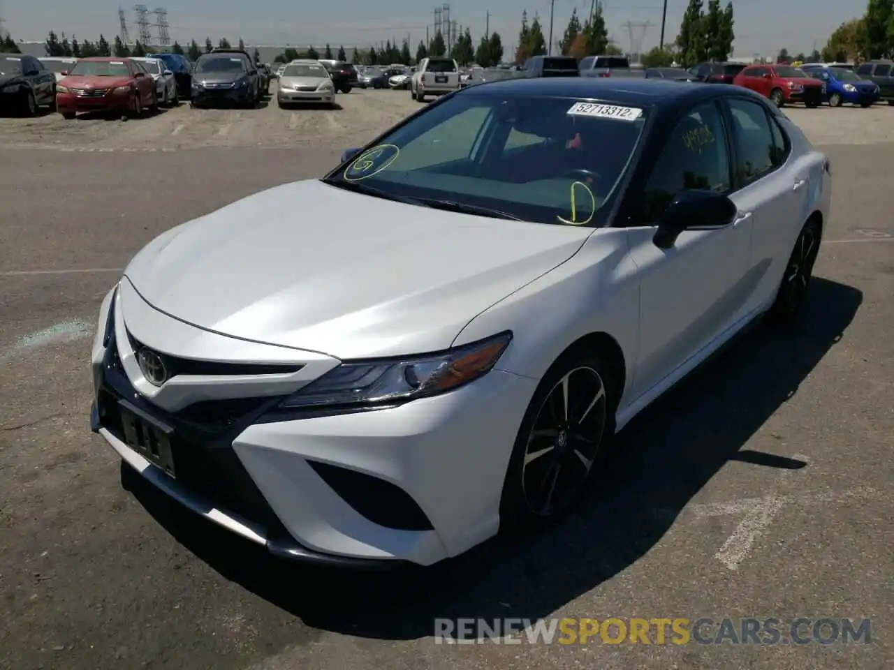 2 Photograph of a damaged car 4T1B61HK1KU220242 TOYOTA CAMRY 2019