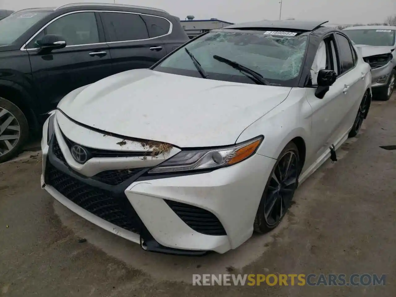 2 Photograph of a damaged car 4T1B61HK1KU232830 TOYOTA CAMRY 2019