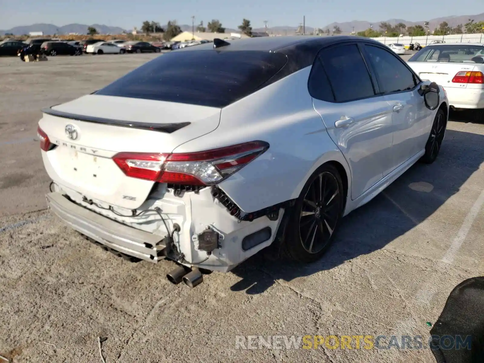 4 Photograph of a damaged car 4T1B61HK1KU242466 TOYOTA CAMRY 2019