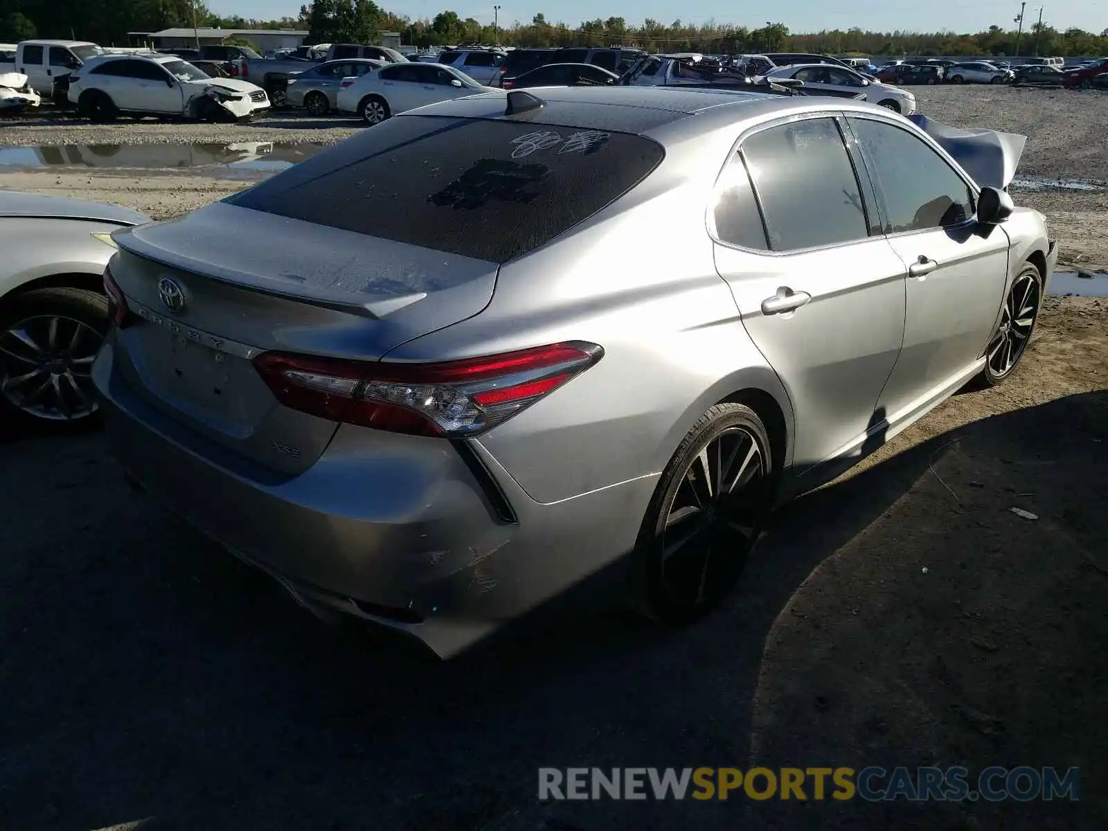 4 Photograph of a damaged car 4T1B61HK1KU698340 TOYOTA CAMRY 2019