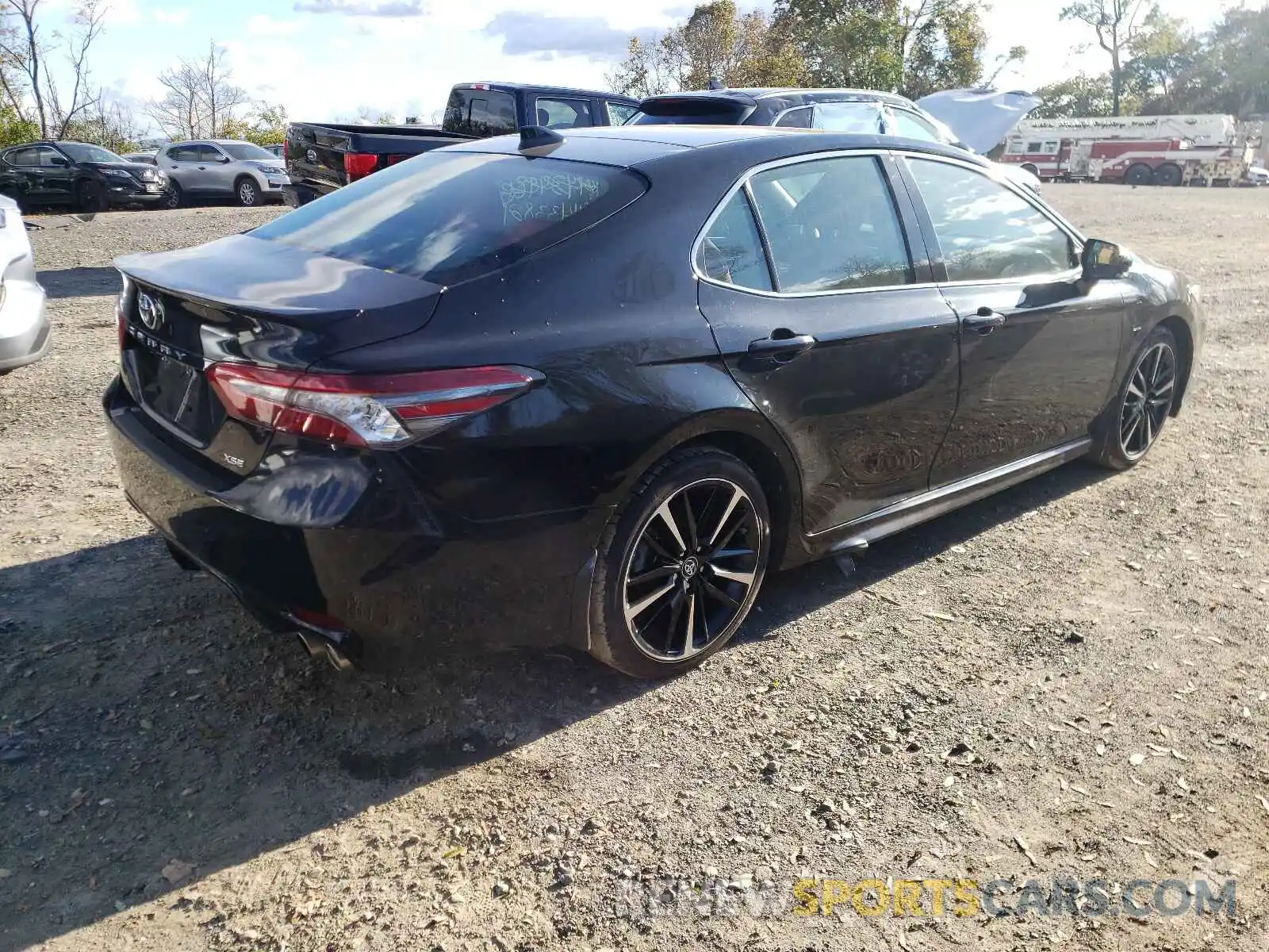 4 Photograph of a damaged car 4T1B61HK1KU811428 TOYOTA CAMRY 2019