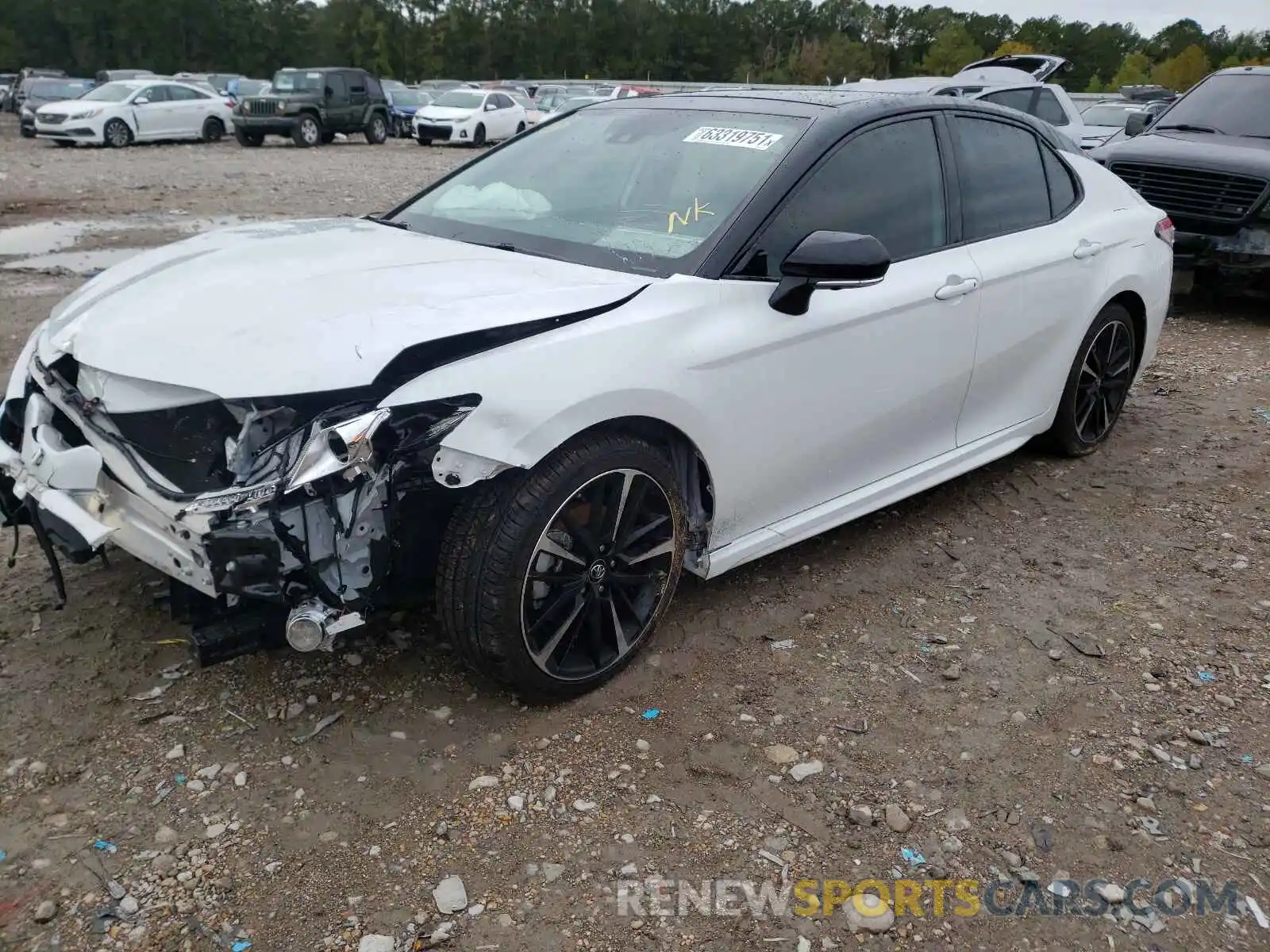 2 Photograph of a damaged car 4T1B61HK2KU244517 TOYOTA CAMRY 2019