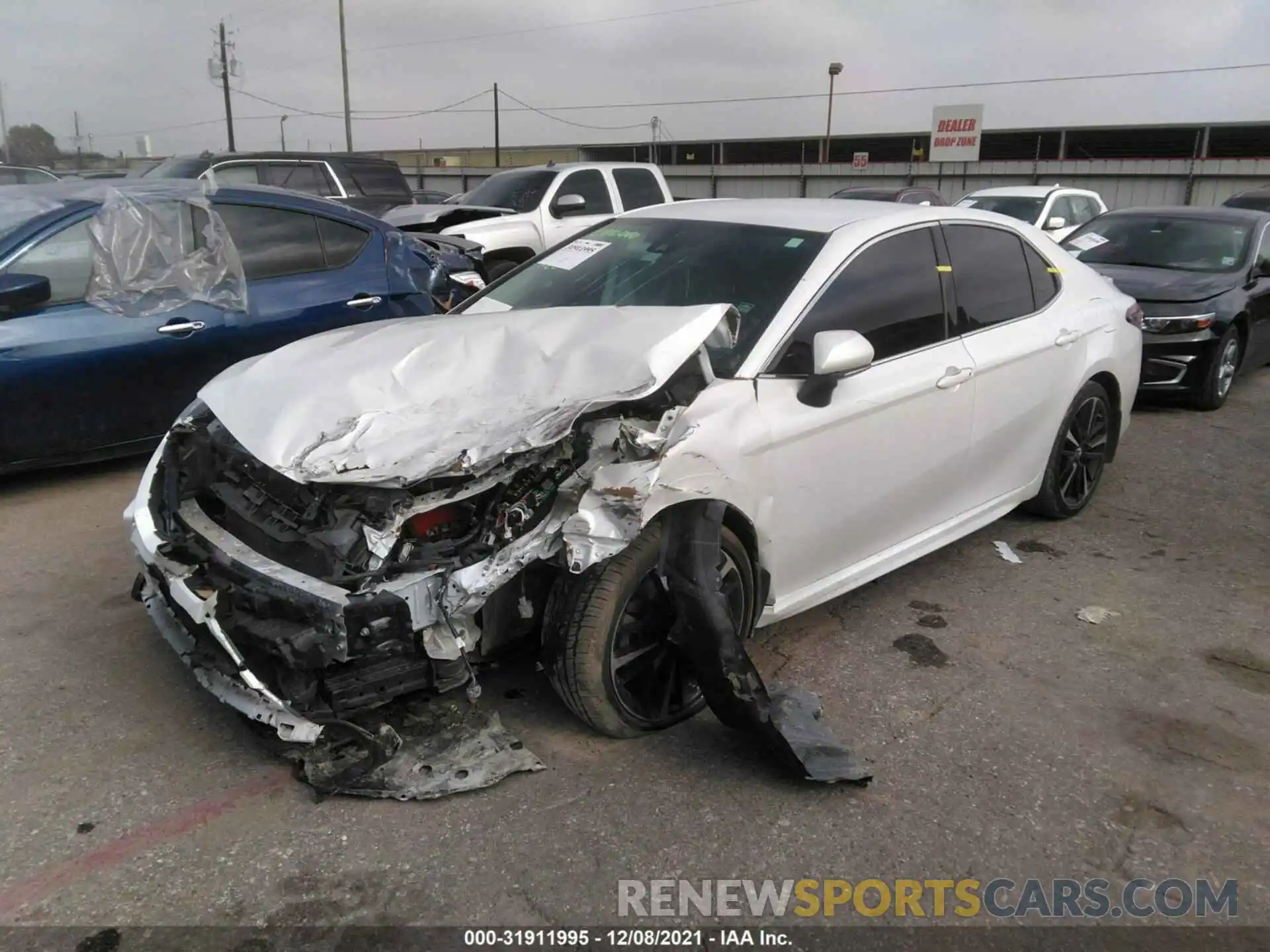 2 Photograph of a damaged car 4T1B61HK2KU690120 TOYOTA CAMRY 2019