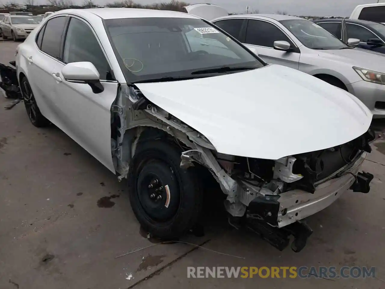 1 Photograph of a damaged car 4T1B61HK2KU693731 TOYOTA CAMRY 2019