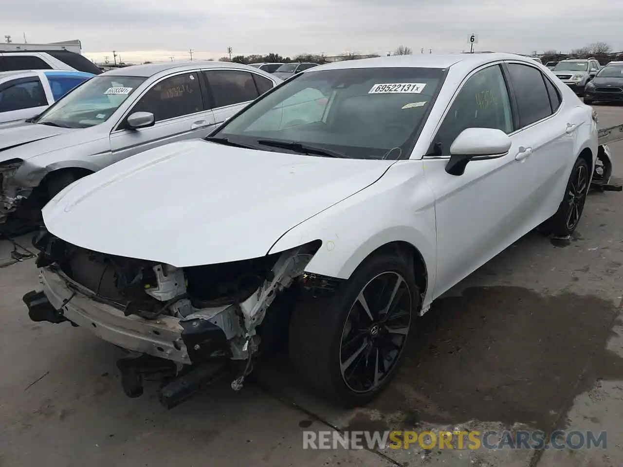 2 Photograph of a damaged car 4T1B61HK2KU693731 TOYOTA CAMRY 2019