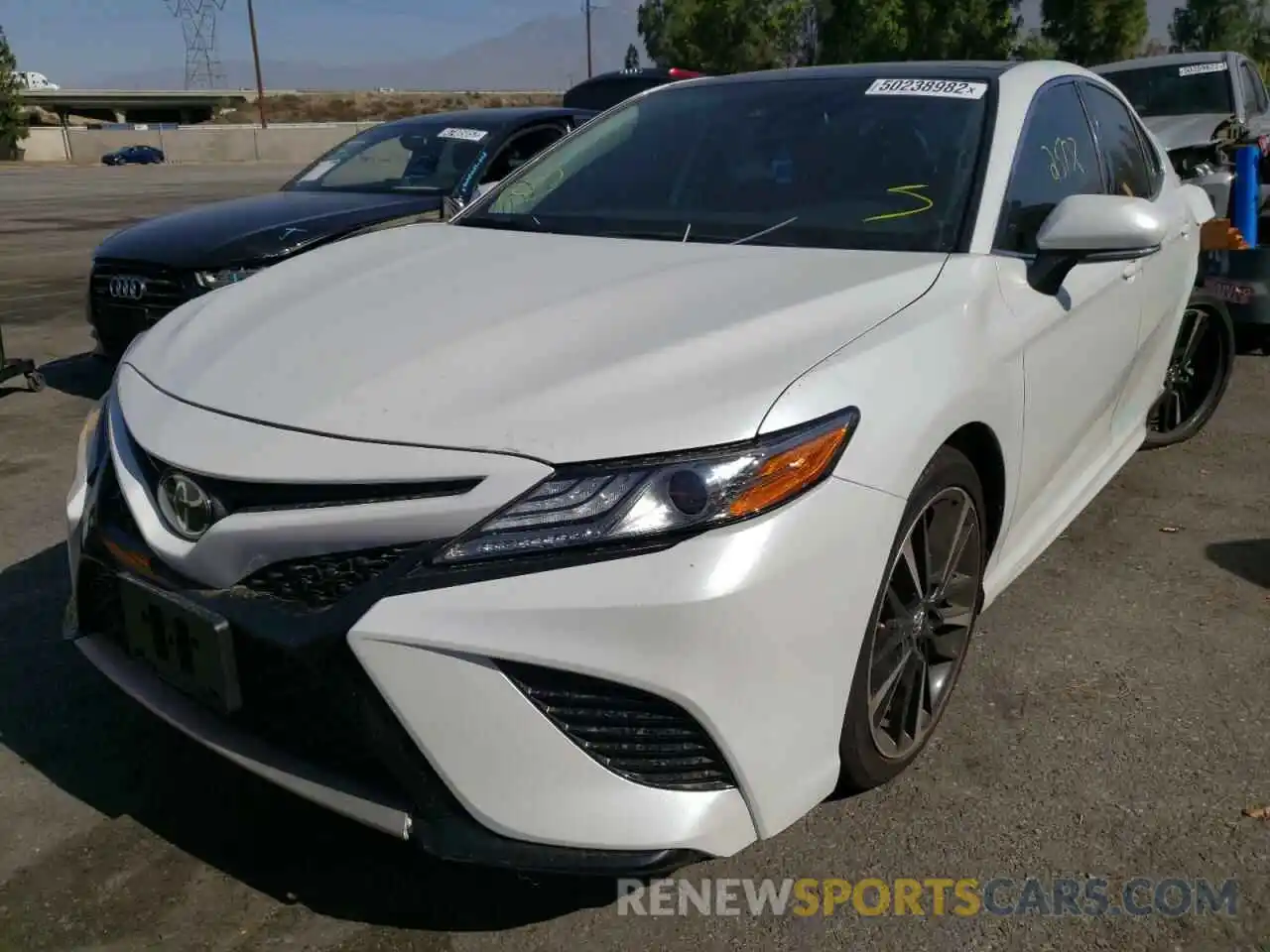 2 Photograph of a damaged car 4T1B61HK2KU766855 TOYOTA CAMRY 2019