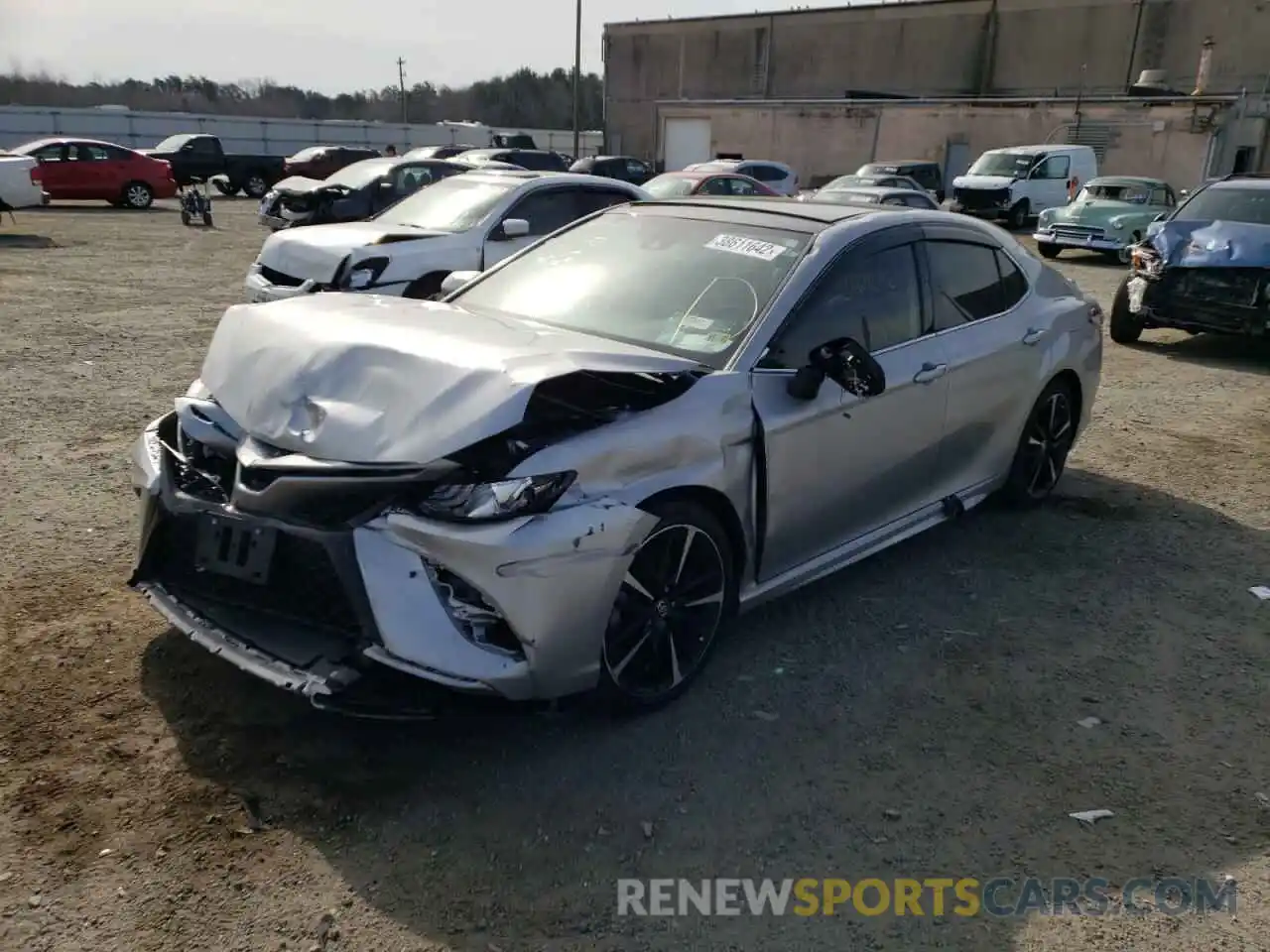 2 Photograph of a damaged car 4T1B61HK2KU823085 TOYOTA CAMRY 2019