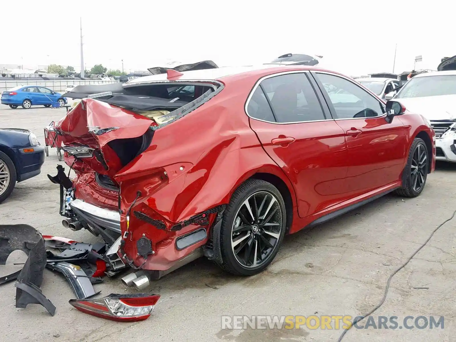 4 Photograph of a damaged car 4T1B61HK3KU187034 TOYOTA CAMRY 2019