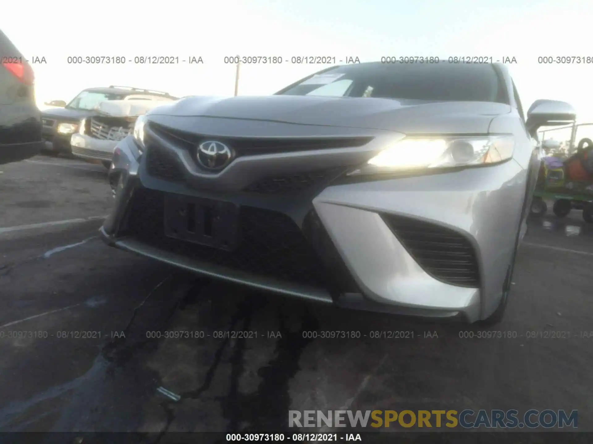 6 Photograph of a damaged car 4T1B61HK3KU210599 TOYOTA CAMRY 2019