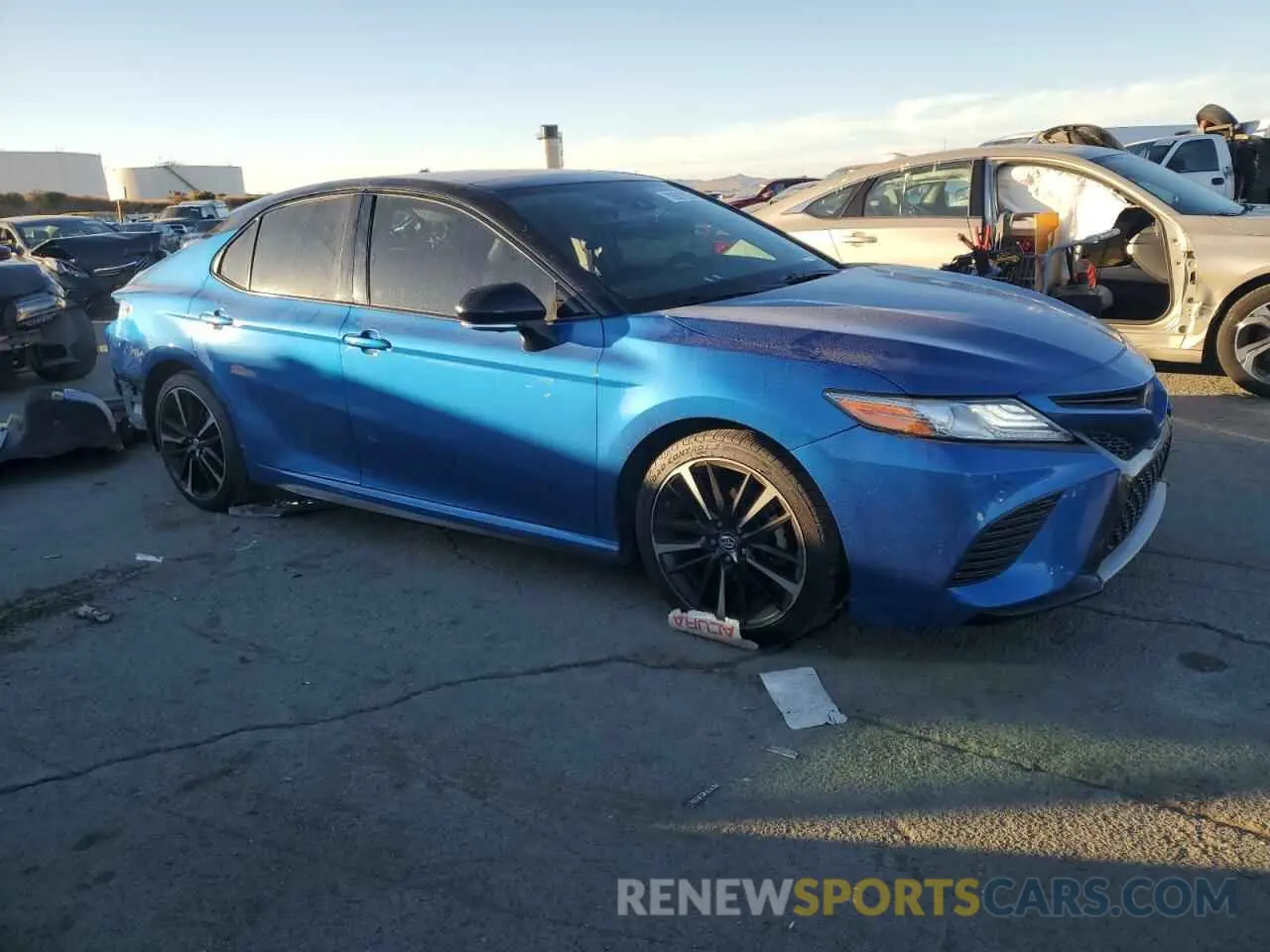 4 Photograph of a damaged car 4T1B61HK3KU219321 TOYOTA CAMRY 2019