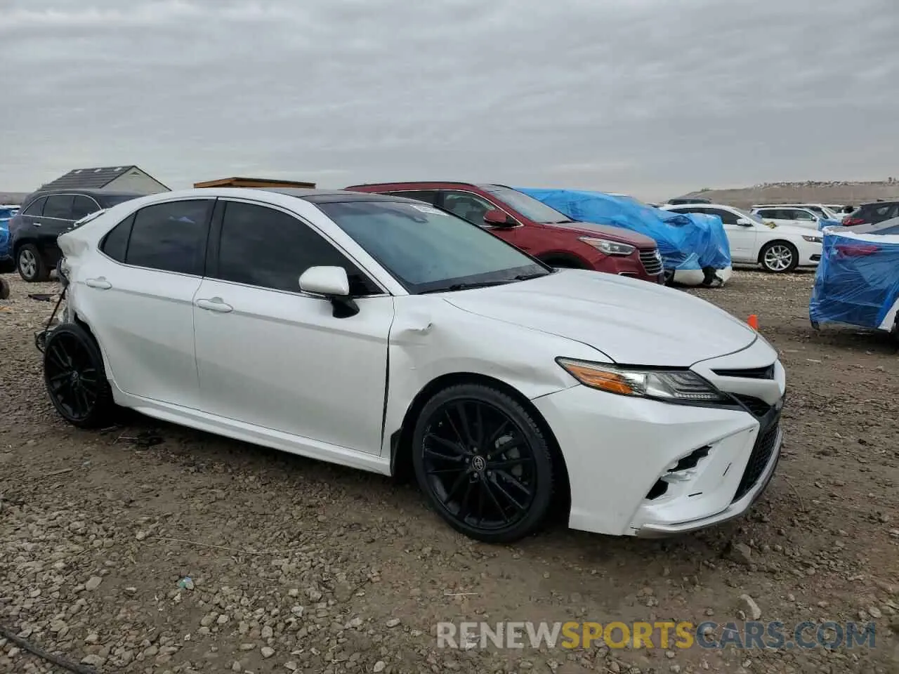 4 Photograph of a damaged car 4T1B61HK3KU742418 TOYOTA CAMRY 2019