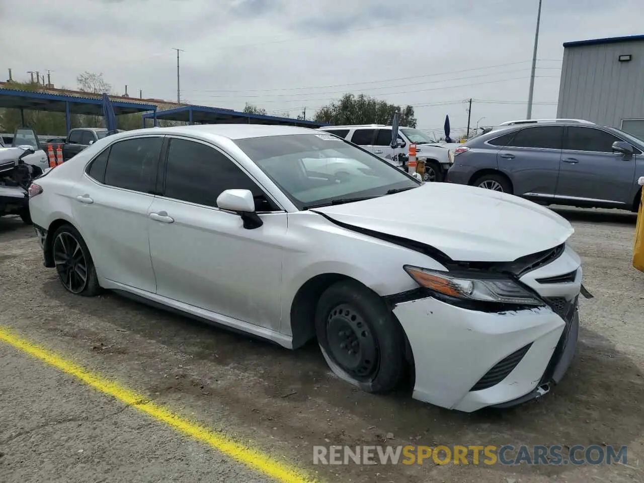 4 Photograph of a damaged car 4T1B61HK3KU839389 TOYOTA CAMRY 2019