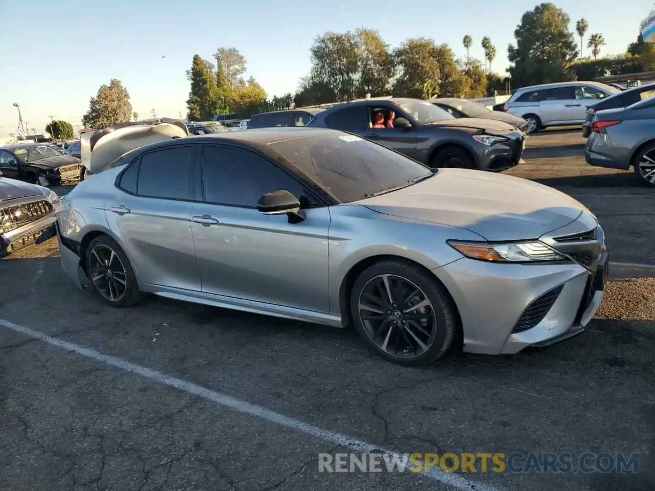 4 Photograph of a damaged car 4T1B61HK4KU287868 TOYOTA CAMRY 2019