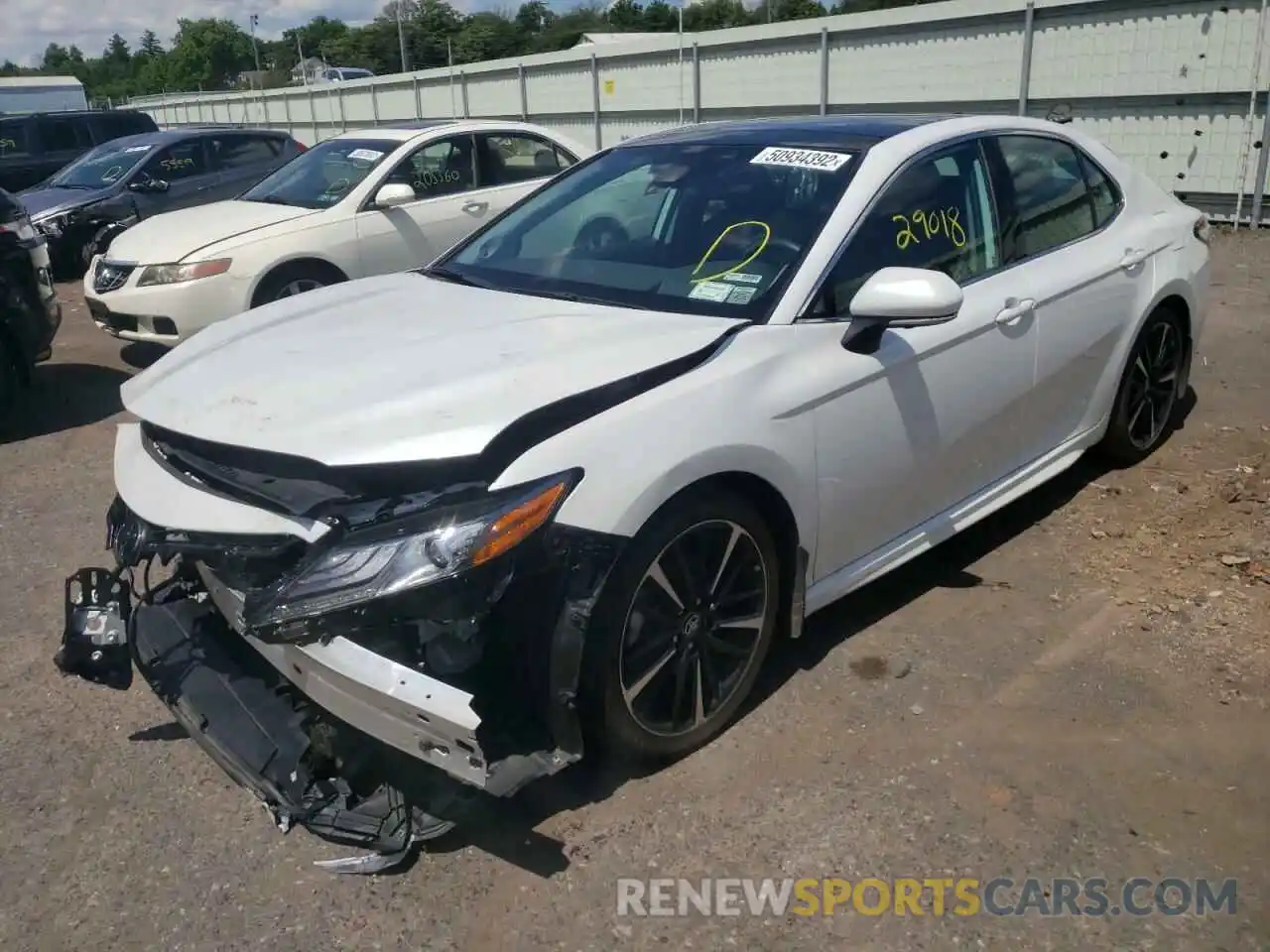 2 Photograph of a damaged car 4T1B61HK4KU696808 TOYOTA CAMRY 2019