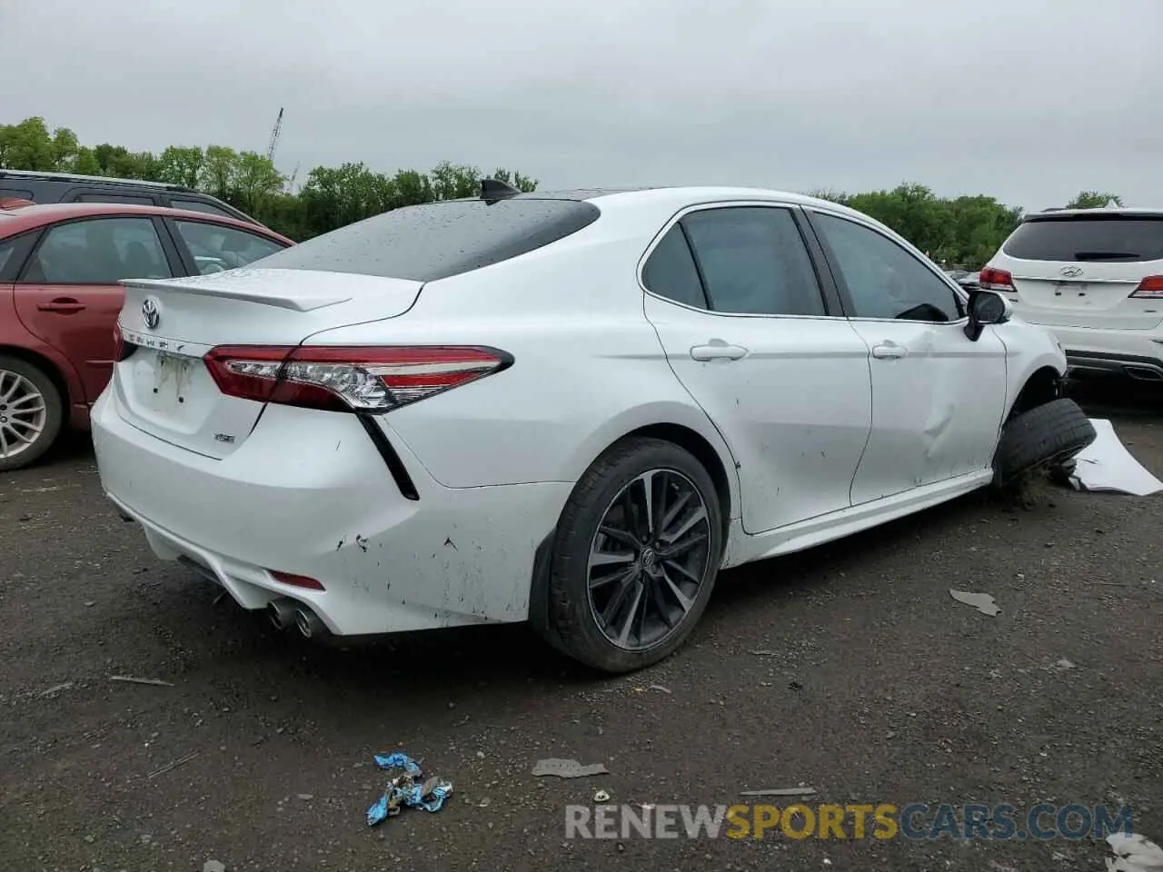 3 Photograph of a damaged car 4T1B61HK5KU691763 TOYOTA CAMRY 2019