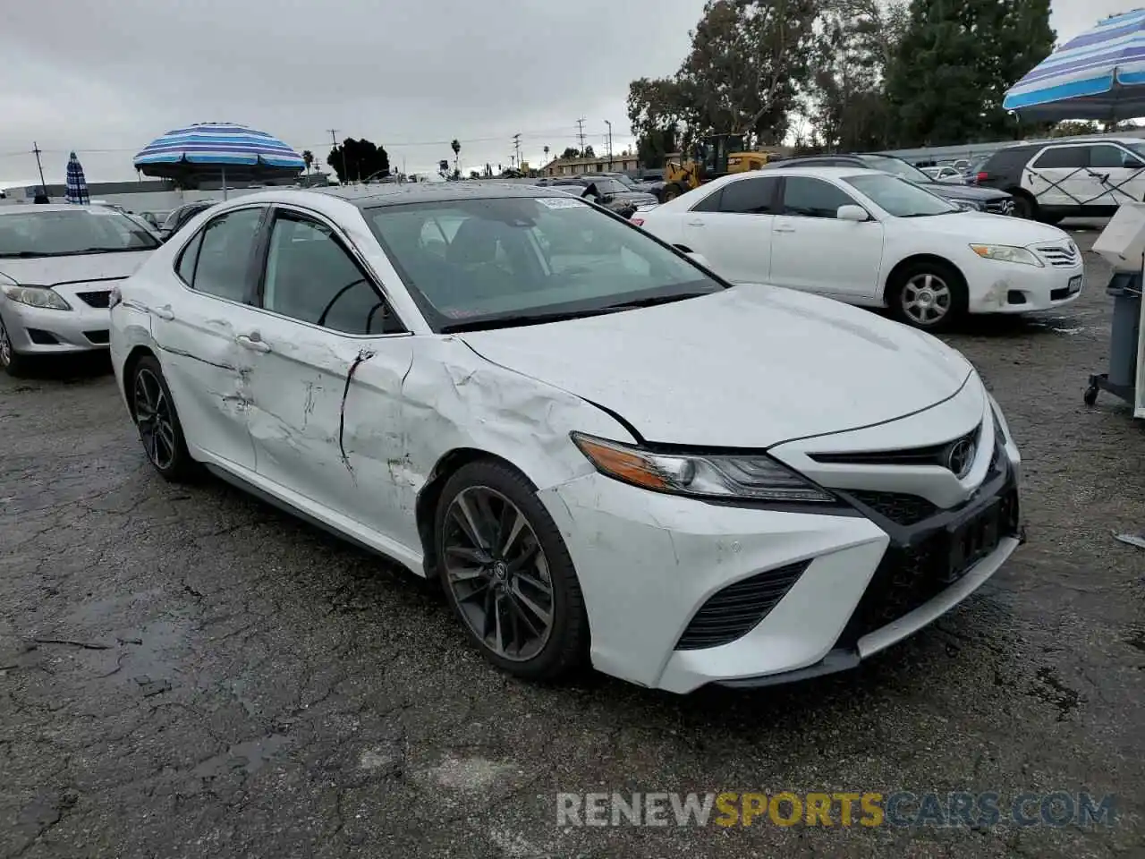 4 Photograph of a damaged car 4T1B61HK5KU839264 TOYOTA CAMRY 2019