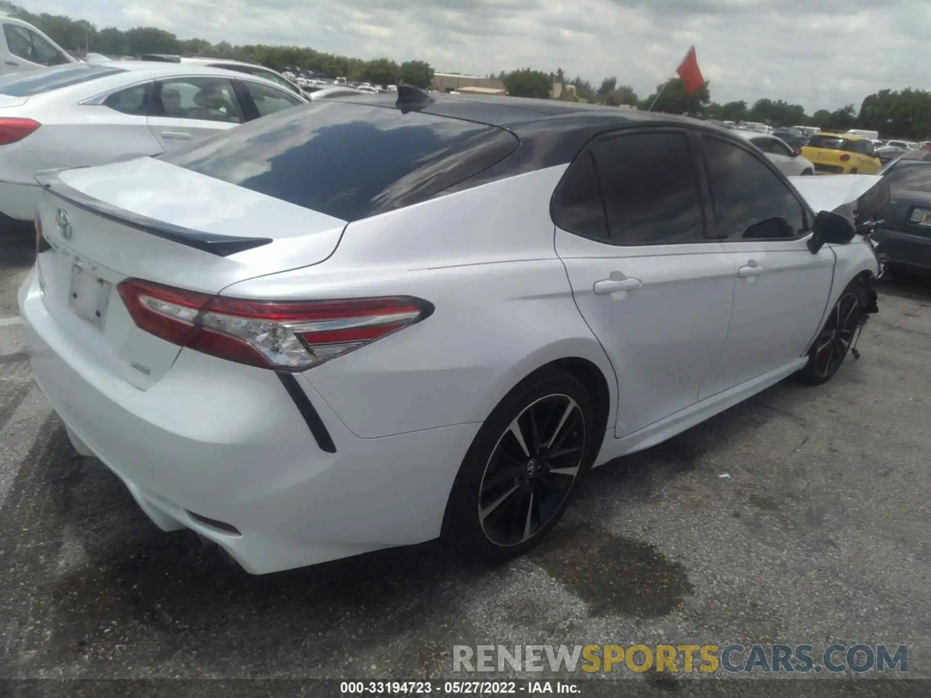 4 Photograph of a damaged car 4T1B61HK6KU260865 TOYOTA CAMRY 2019