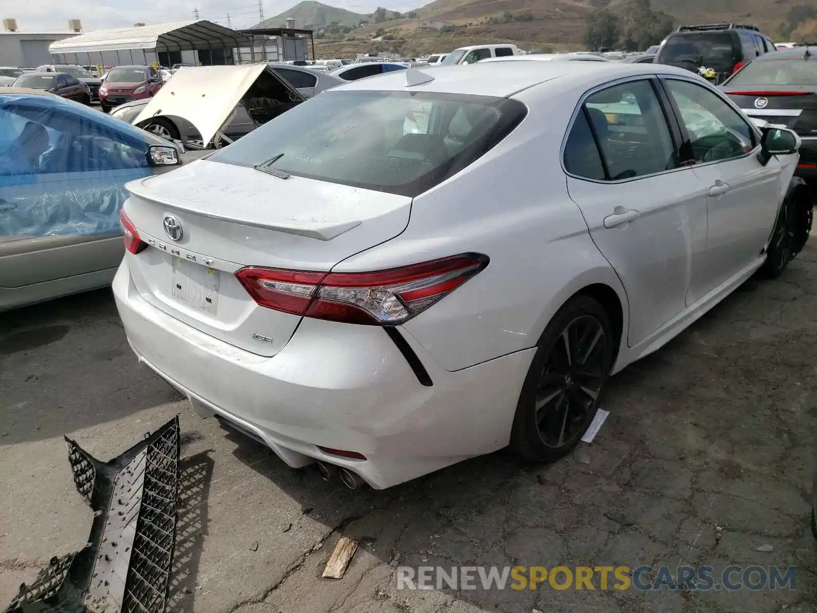 4 Photograph of a damaged car 4T1B61HK7KU705128 TOYOTA CAMRY 2019