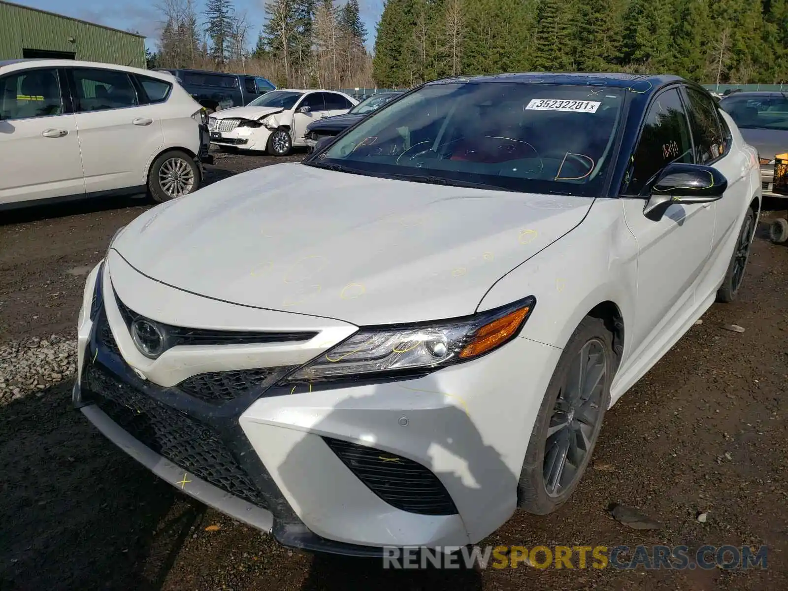 2 Photograph of a damaged car 4T1B61HK8KU199759 TOYOTA CAMRY 2019