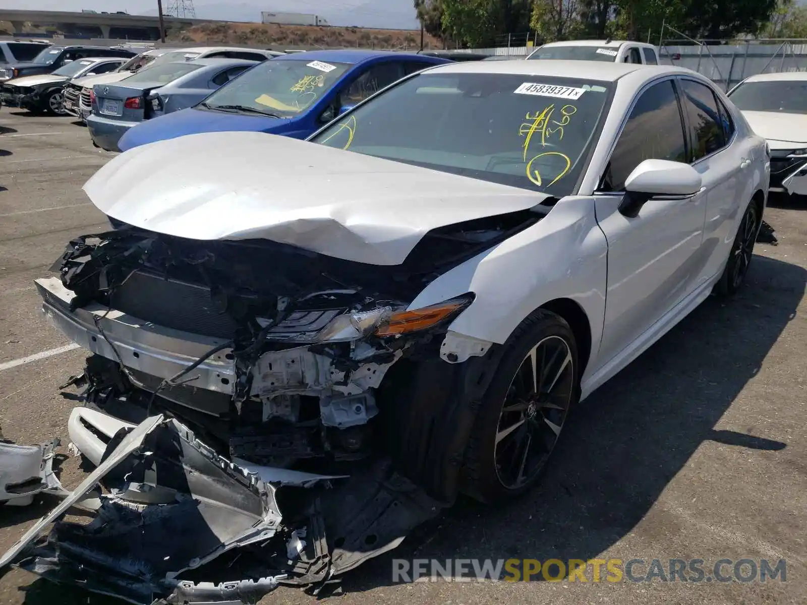 2 Photograph of a damaged car 4T1B61HK8KU715909 TOYOTA CAMRY 2019