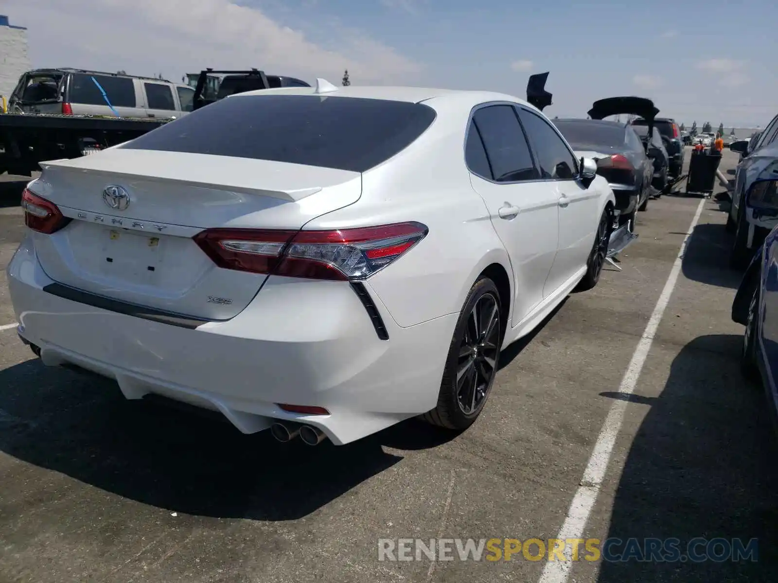 4 Photograph of a damaged car 4T1B61HK8KU715909 TOYOTA CAMRY 2019