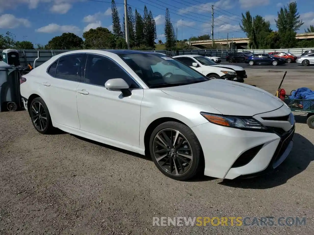 4 Photograph of a damaged car 4T1B61HK8KU843857 TOYOTA CAMRY 2019