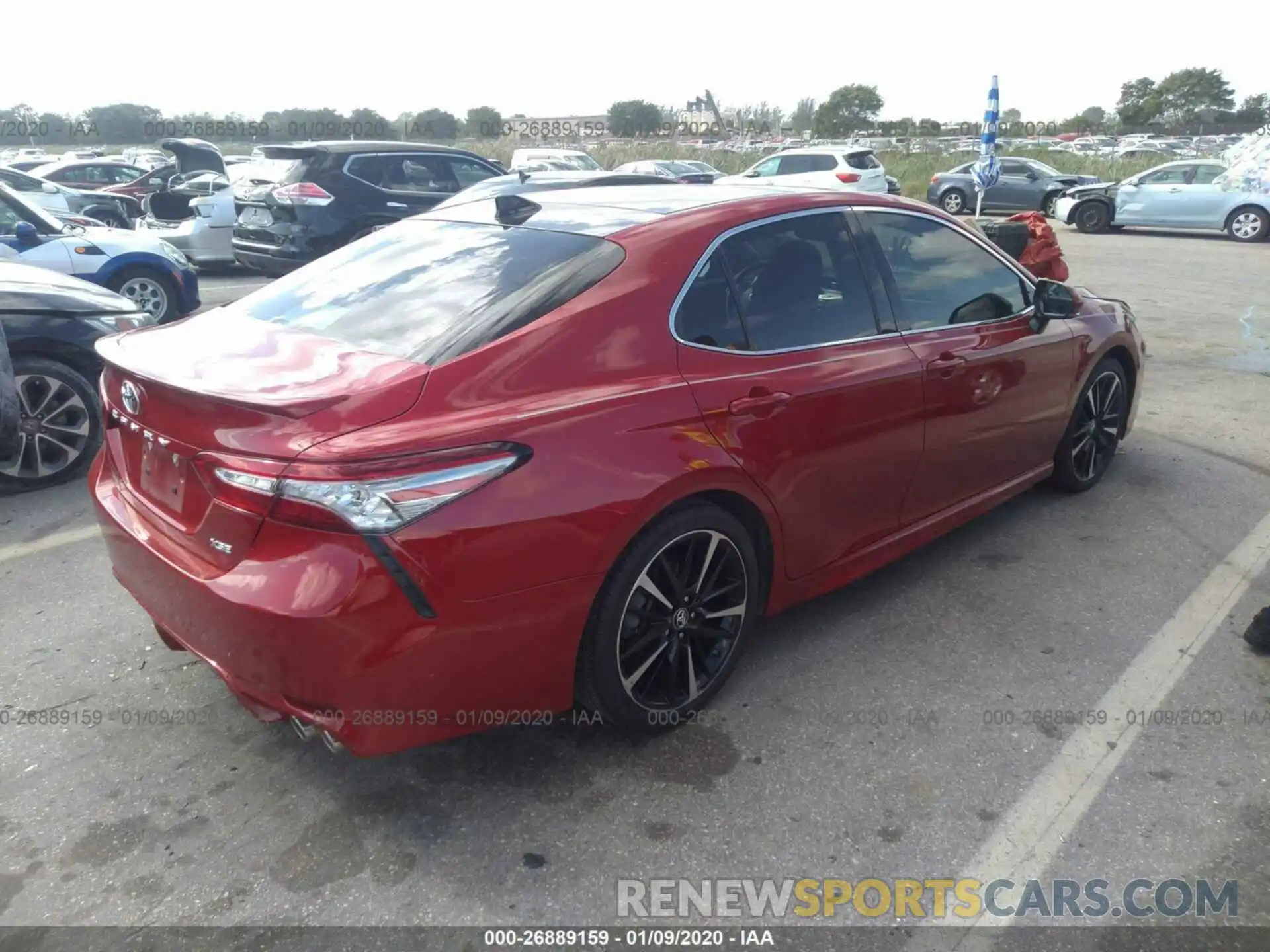 4 Photograph of a damaged car 4T1B61HK9KU197230 TOYOTA CAMRY 2019