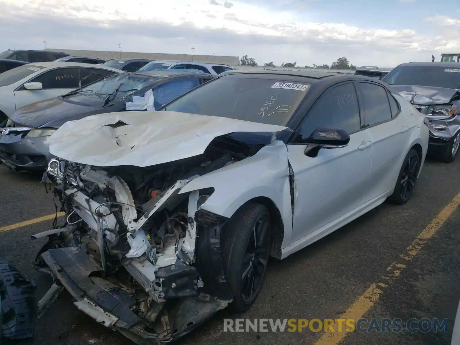 2 Photograph of a damaged car 4T1B61HKXKU272999 TOYOTA CAMRY 2019