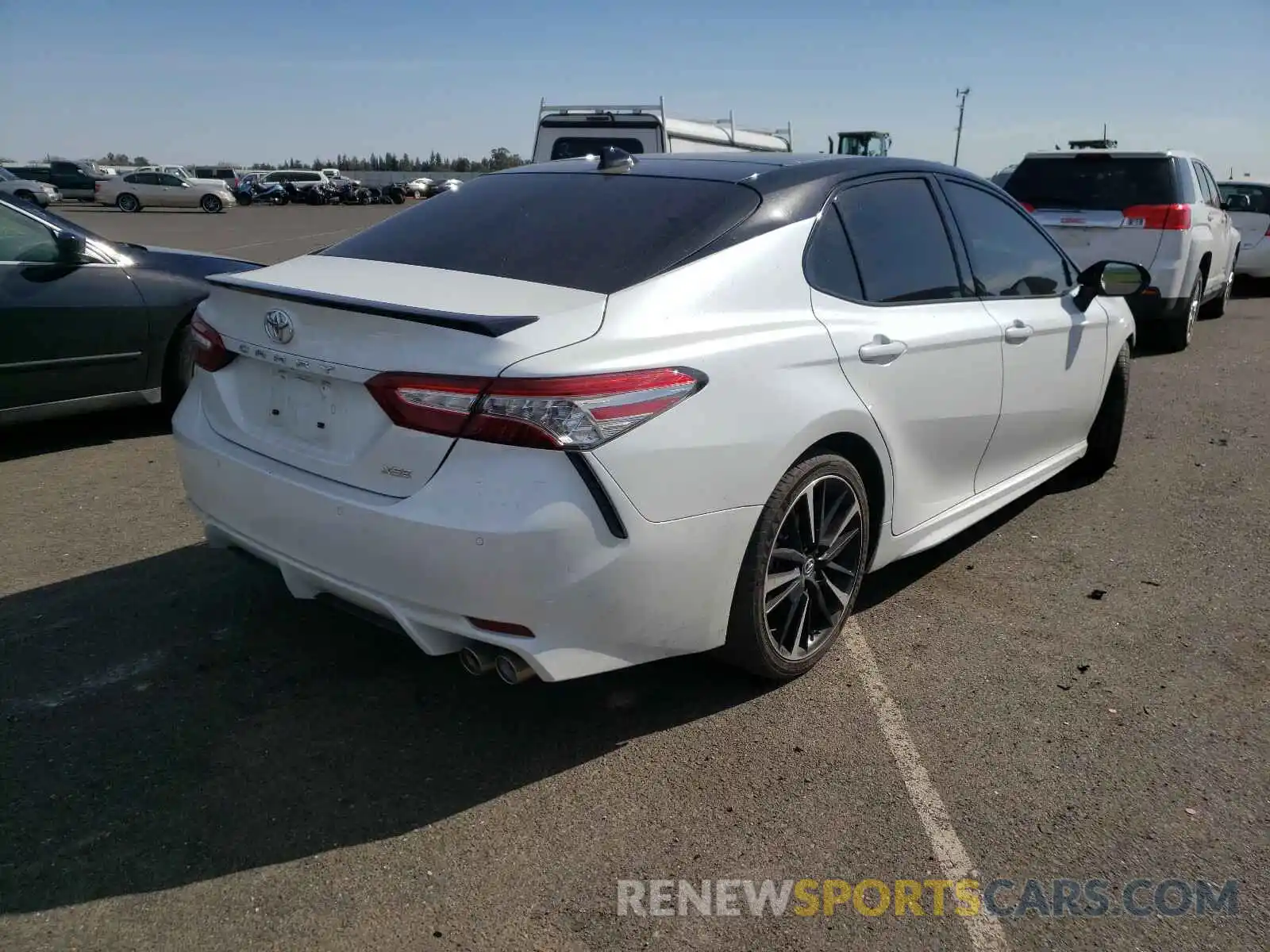 4 Photograph of a damaged car 4T1B61HKXKU272999 TOYOTA CAMRY 2019