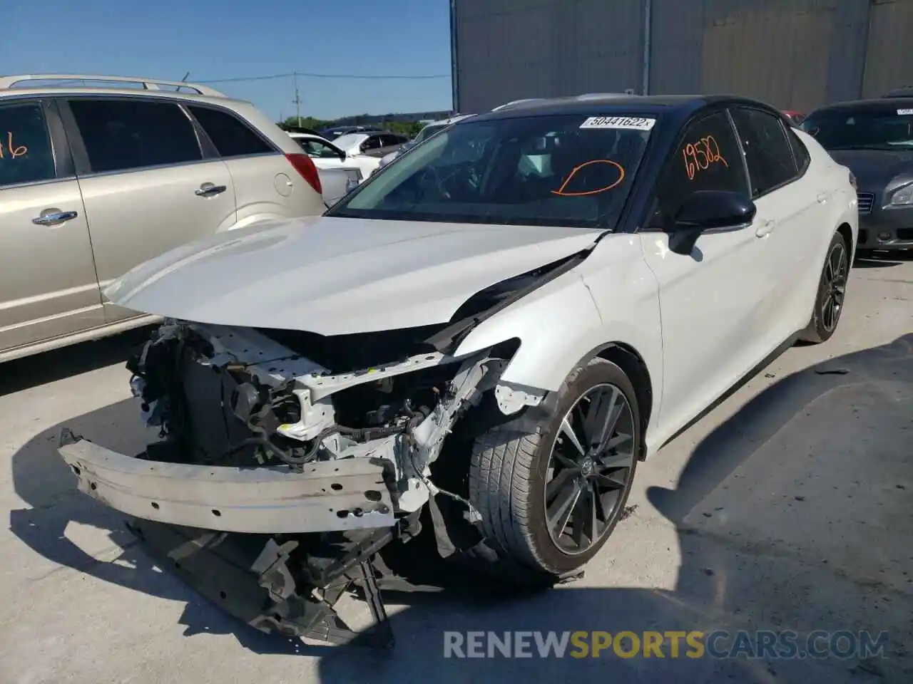 2 Photograph of a damaged car 4T1B61HKXKU284747 TOYOTA CAMRY 2019