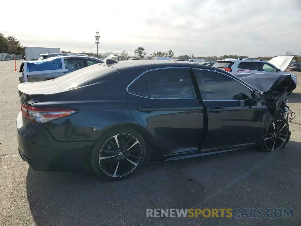 3 Photograph of a damaged car 4T1B61HKXKU700019 TOYOTA CAMRY 2019