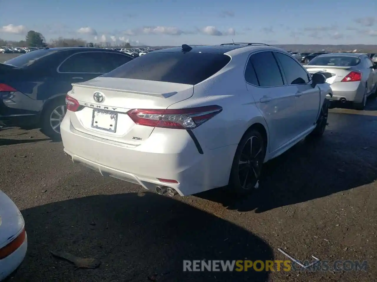 4 Photograph of a damaged car 4T1B61HKXKU778638 TOYOTA CAMRY 2019