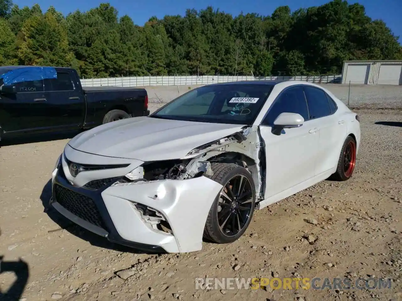 2 Photograph of a damaged car 4T1B61HKXKU834559 TOYOTA CAMRY 2019