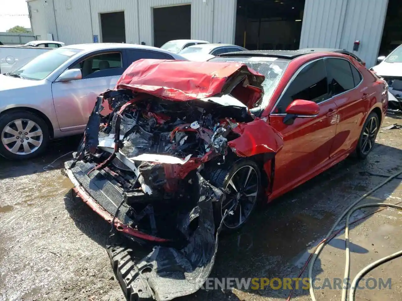 2 Photograph of a damaged car 4T1BZ1HK0KU024087 TOYOTA CAMRY 2019